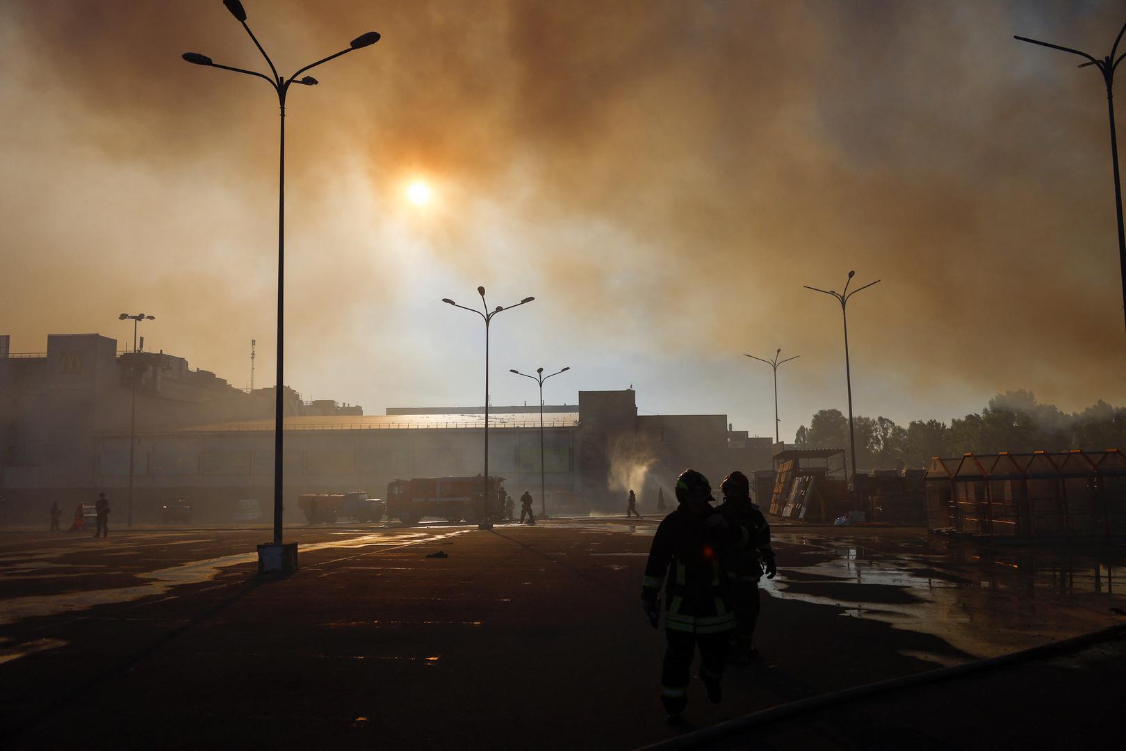 Firefighters work at the site of a household item shopping mall which was hit by a Russian air strike, amid Russia's attack on Ukraine, in Kharkiv, Ukraine, May 25, 2024. REUTERS/Valentyn Ogirenko Photo: VALENTYN OGIRENKO/REUTERS