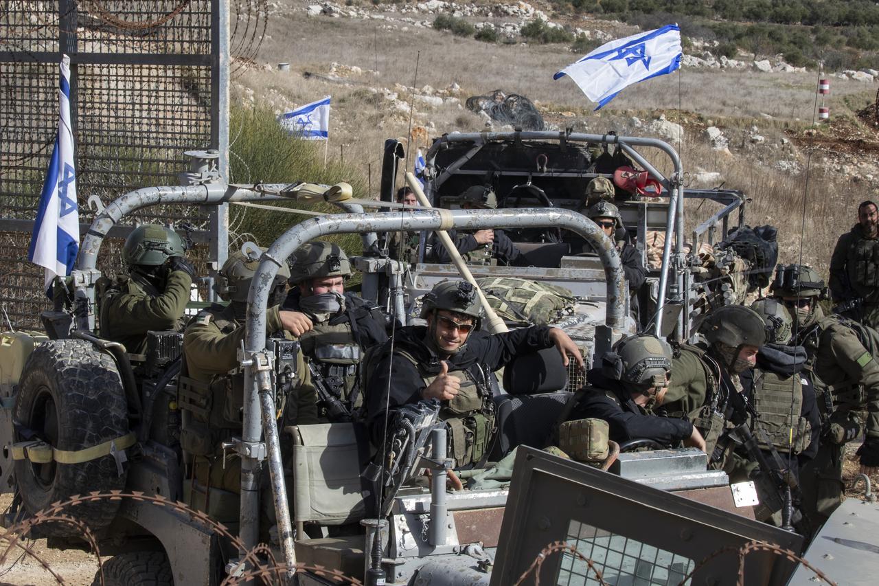 Israeli soldiers at the Golan Heights border with Syria