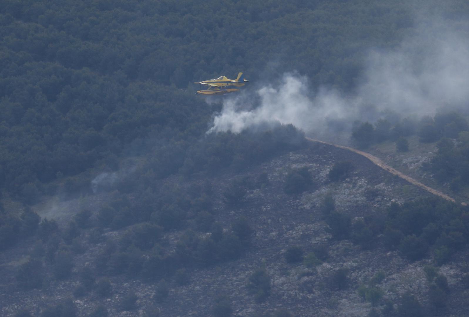 22.04.2024., Vrpolje - Pozar na nepristupacnom terenu izmedju Vrpolja i Grebastice. Photo: Dusko Jaramaz/PIXSELL