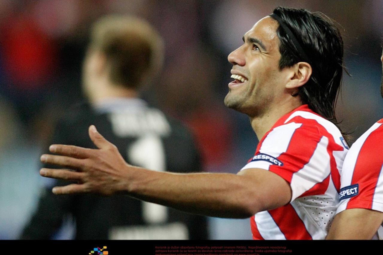 'Atletico de Madrid\'s Radamel Falcao celebrates during UEFA Europa League Match. March 29, 2012. Foto Ÿ nph / Alvaro Hernandez) *** Local Caption ***'