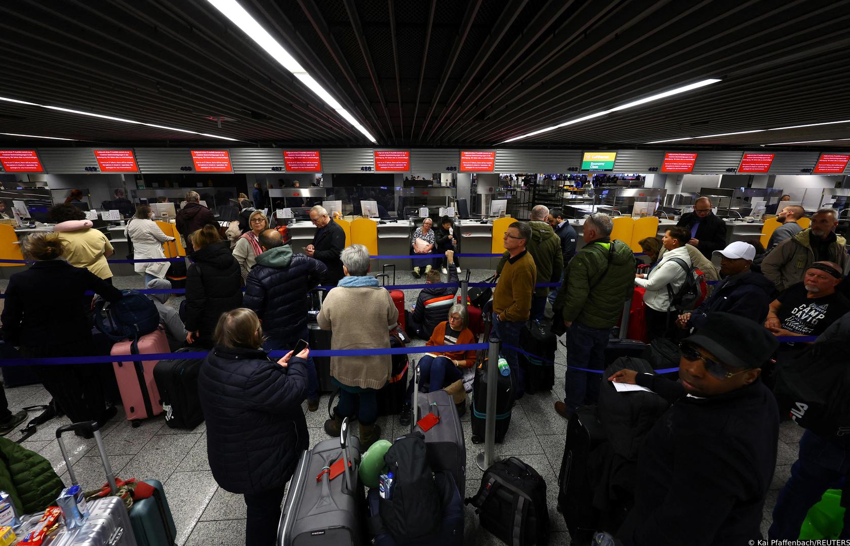 Passengers wait at a Lufthansa check in counter after an IT fault at Germany?s Lufthansa causes massive flight delays and disruptions in Frankfurt, Germany, February 15, 2023.     REUTERS/Kai Pfaffenbach Photo: Kai Pfaffenbach/REUTERS