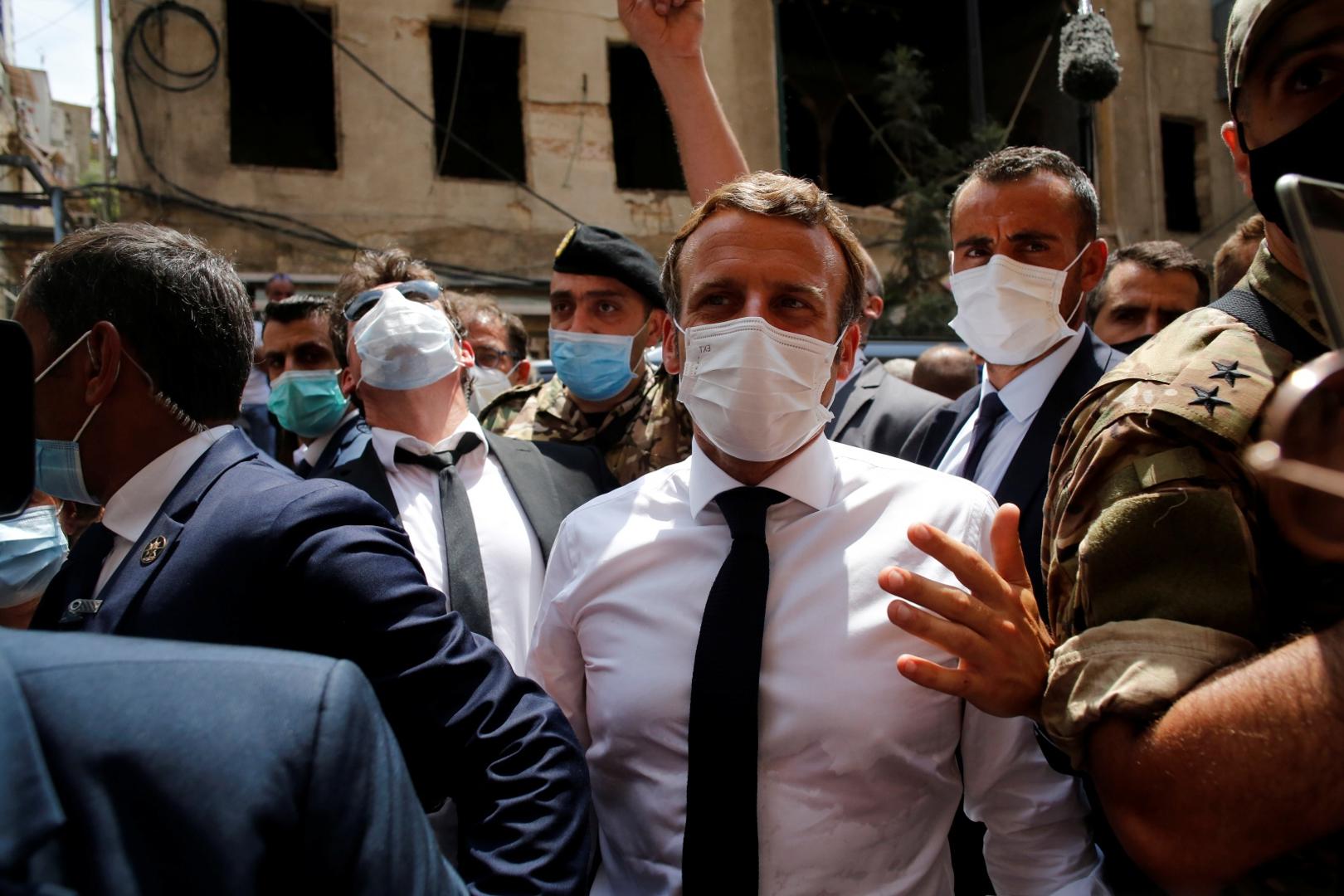 French President Emmanuel Macron visits devastated streets of Beirut French President Emmanuel Macron visits a devastated street of Beirut, Lebanon August 6, 2020. Thibault Camus/Pool via REUTERS POOL