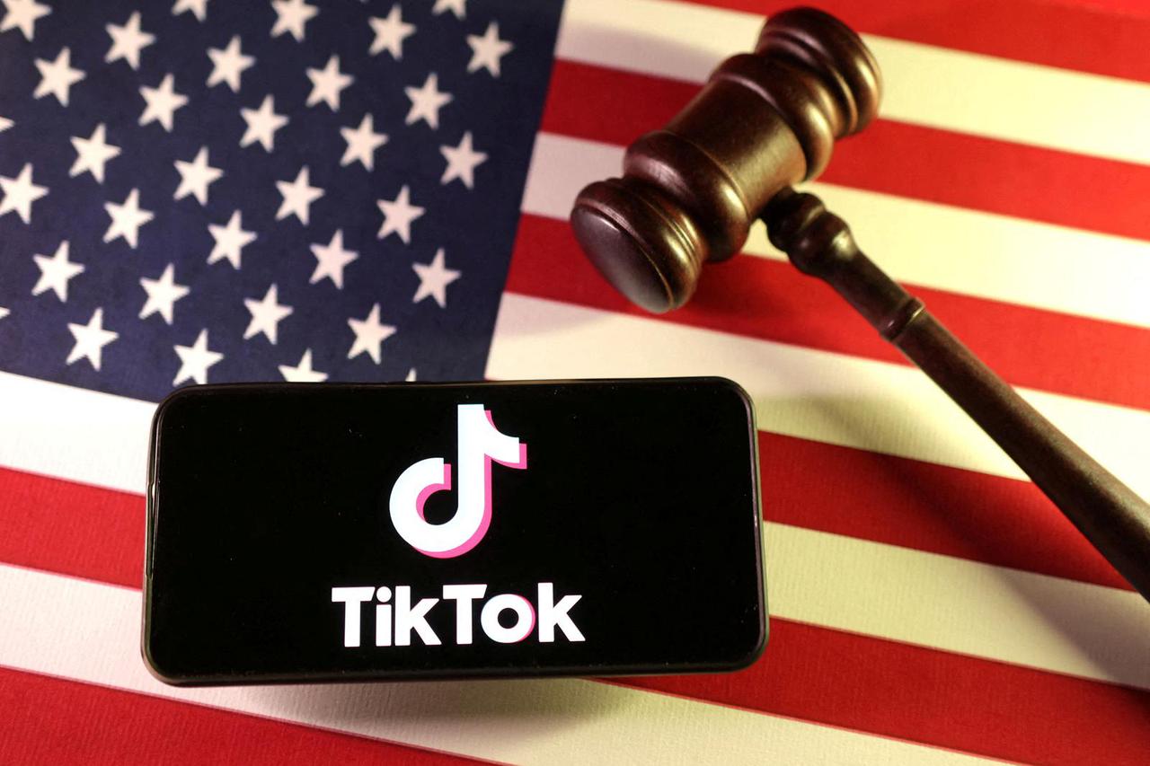 FILE PHOTO: Illustration shows U.S., Chinese flags, TikTok logo and gavel