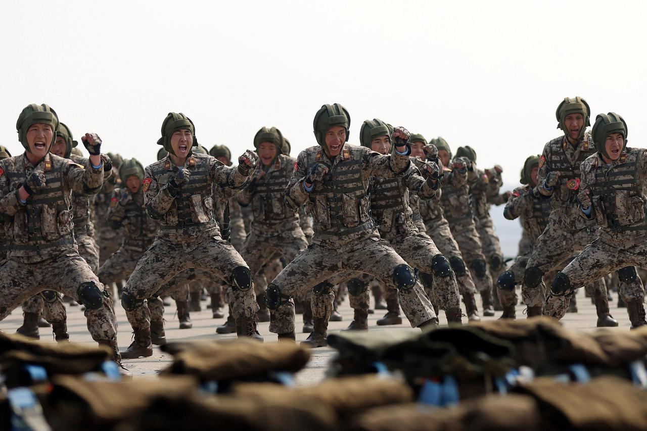 North Korean leader Kim Jong Un guides the training of the Korean People's Army's air and amphibious combat units