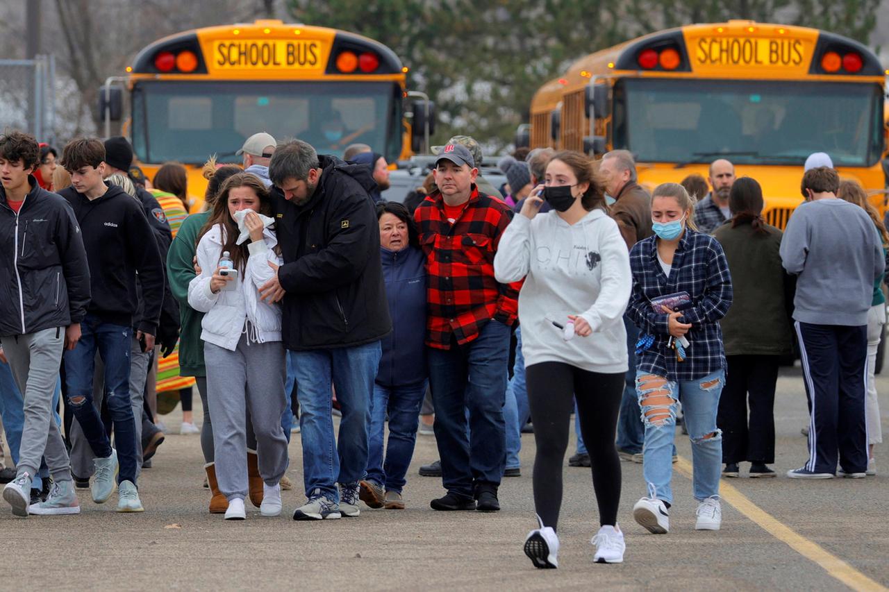 Parents leave with students after Oxford High School Shooting