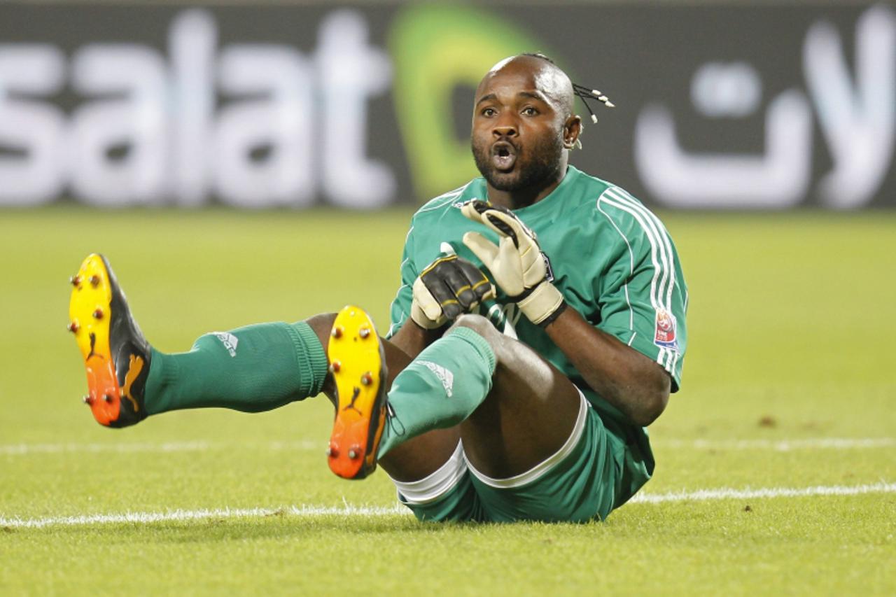 'Goalkeeper Muteba Kidiaba of Congo\'s TP Mazembe celebrates after their Club World Cup semi-final soccer match against Brazil\'s Internacional at Mohammed Bin Zayed Stadium in Abu Dhabi December 14, 