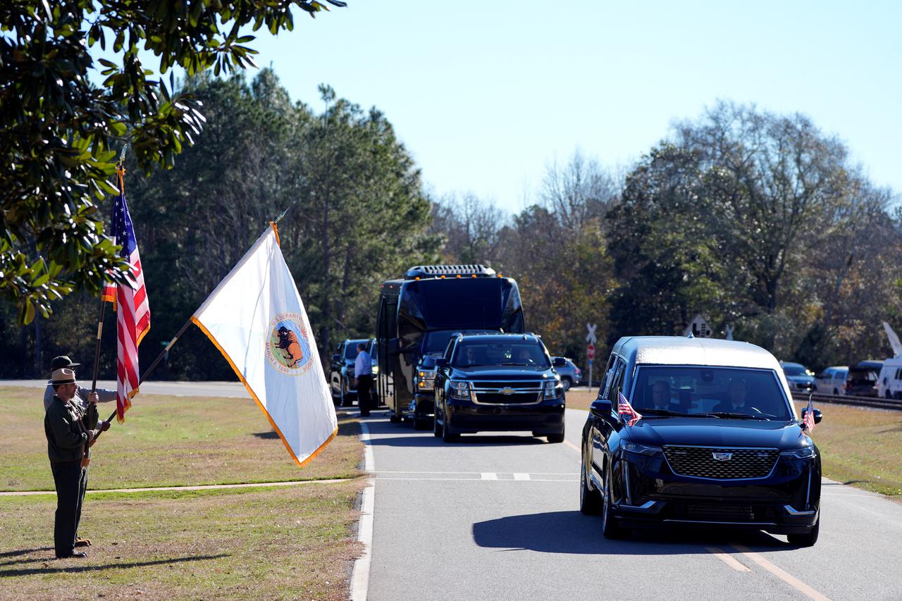 Former U.S. President Carter's casket travels to Atlanta, Georgia