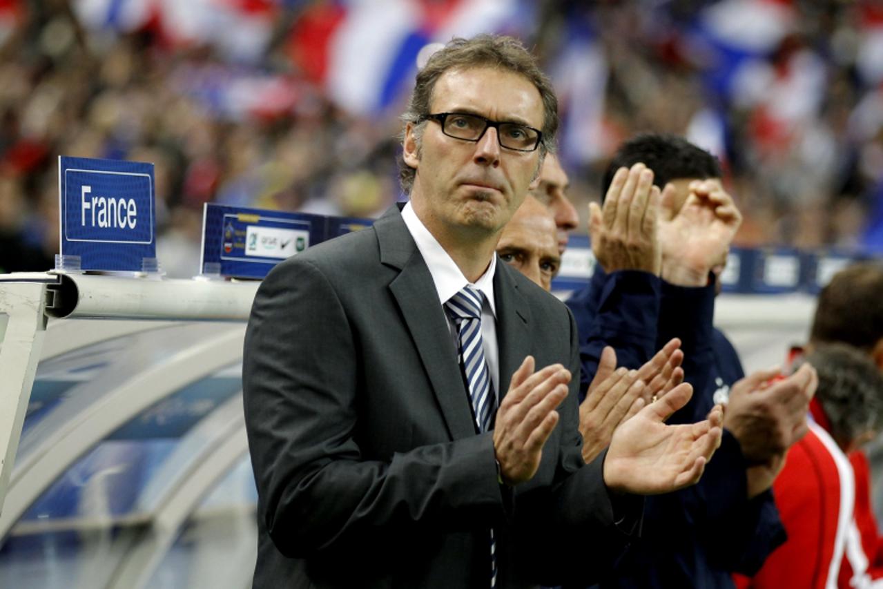 'France\'s head coach Laurent Blanc reacts during their Euro 2012 qualifying Group D soccer match against Bosnia at the Stade de France stadium in Saint-Denis, near Paris October 11, 2011. REUTERS/Ben