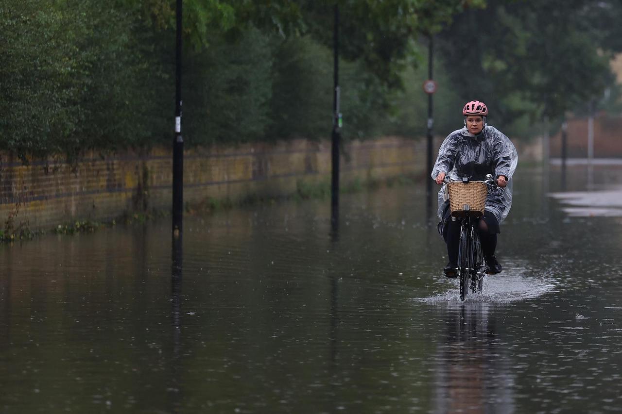 Heavy rain and local flooding for areas of Britain, in London