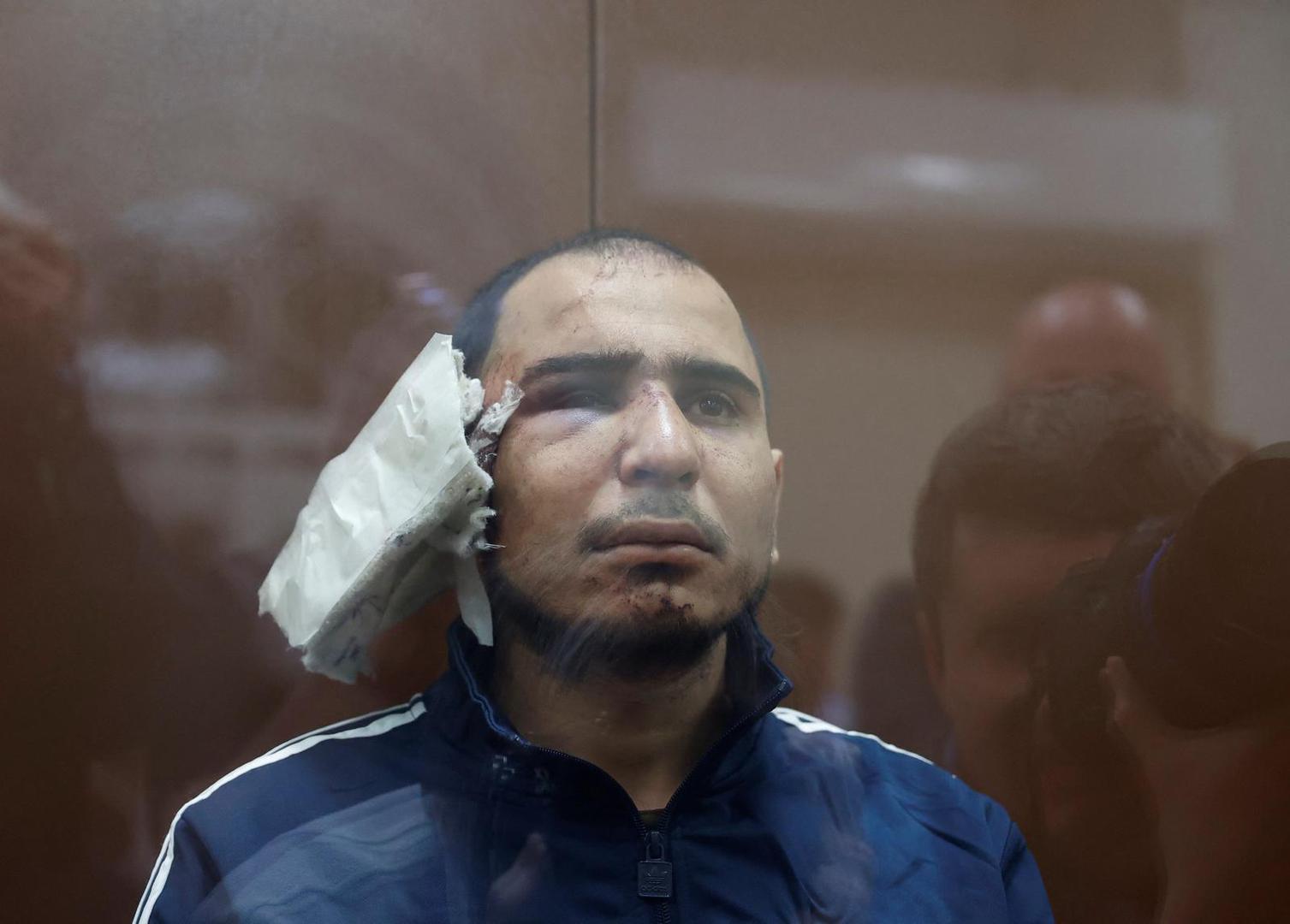 Saidakrami Murodali Rachabalizoda, a suspect in the shooting attack at the Crocus City Hall concert venue, sits behind a glass wall of an enclosure for defendants at the Basmanny district court in Moscow, Russia March 24, 2024. REUTERS/Yulia Morozova Photo: YULIA MOROZOVA/REUTERS