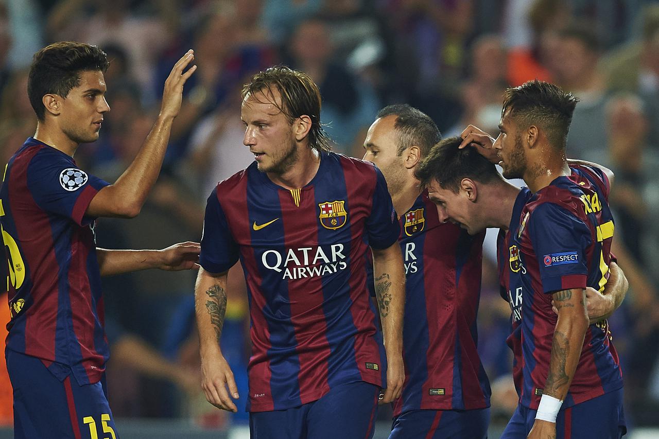 Lionel Messi (FC Barcelona) (2nd R), celebrates after scoring, during the Champions League soccer match between FC Barcelona and Ajax Amsterdam, at the Camp Nou stadium in Barcelona, Spain, tuesday october 21, 2014. Foto: S.Lau/DPA/PIXSELL