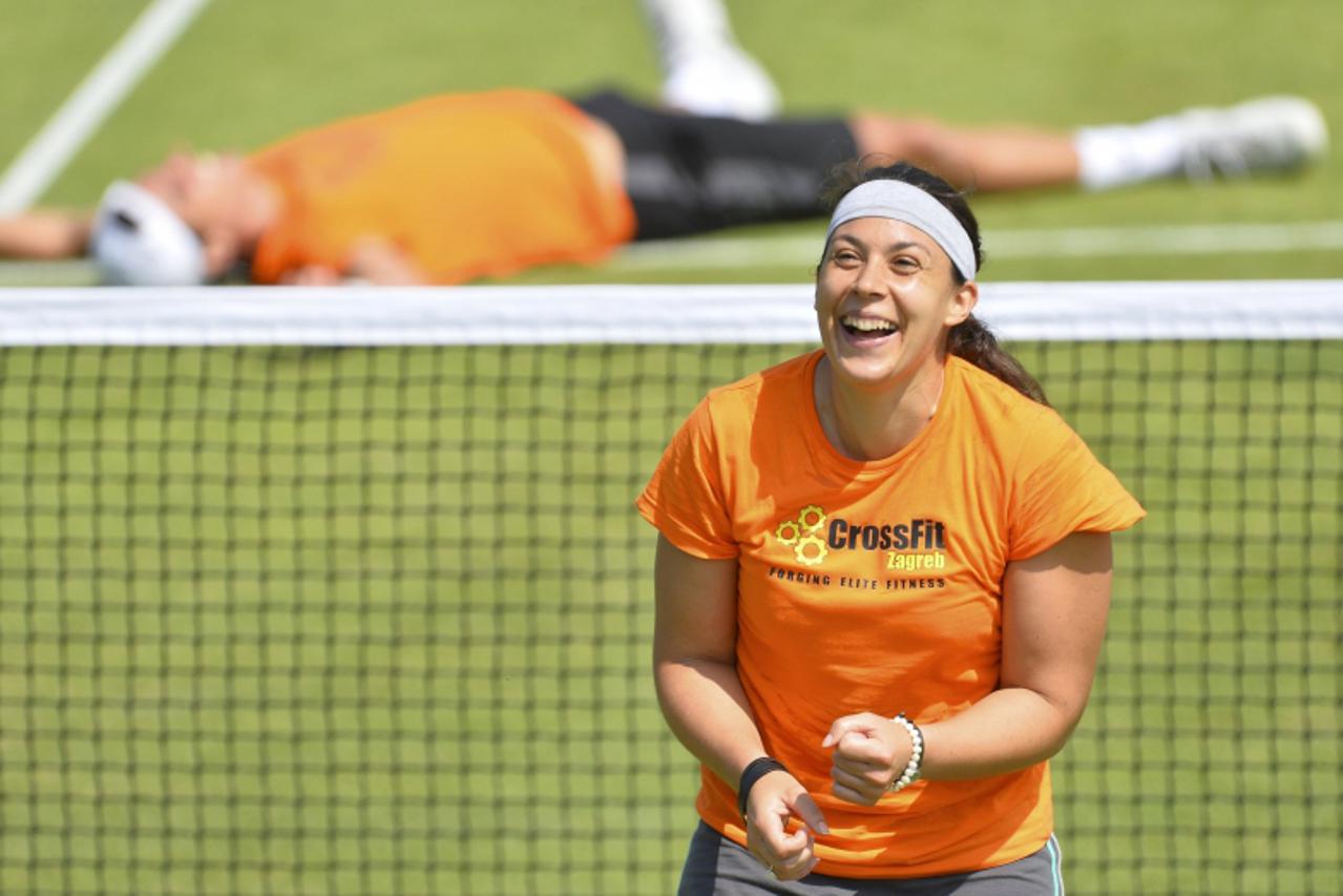 'Marion Bartoli of France trains on a practat the Wiise court mbledon Tennis Championships, in London July 5, 2013.      REUTERS/Toby Melville (BRITAIN  - Tags: SPORT TENNIS)'