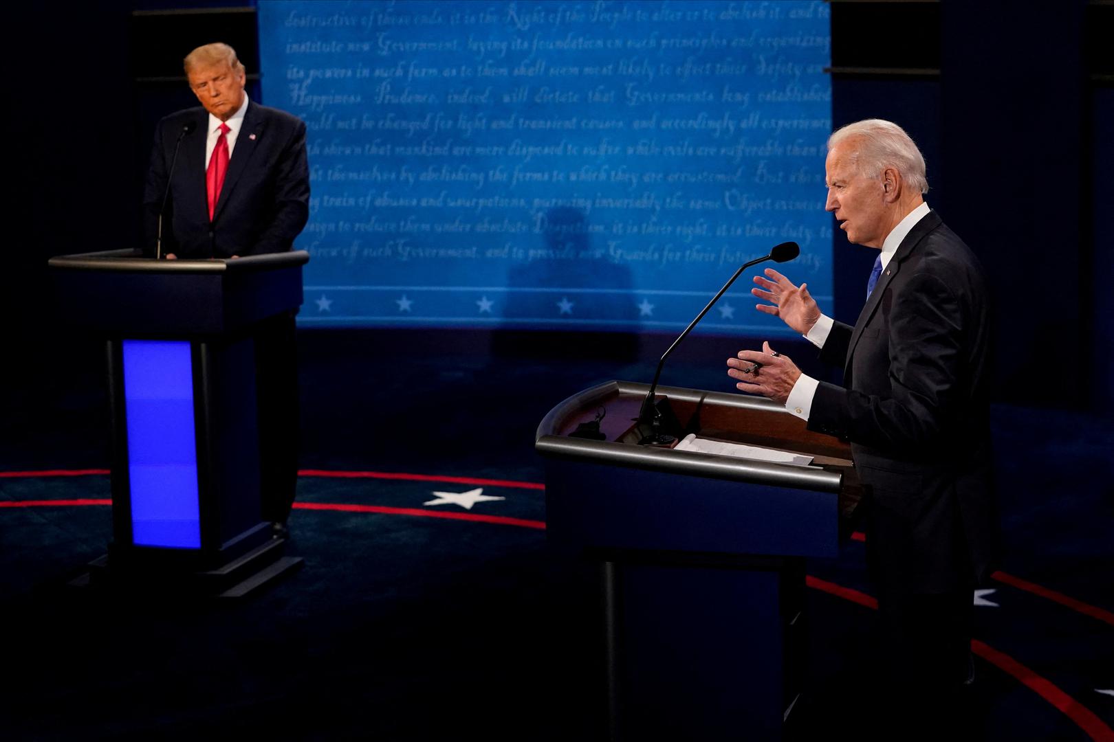 FILE PHOTO: Democratic presidential candidate former Vice President Joe Biden answers a question as President Donald Trump listens during the second and final presidential debate at the Curb Event Center at Belmont University in Nashville, Tennessee, U.S., October 22, 2020. Morry Gash/Pool via REUTERS/File Photo Photo: POOL/REUTERS