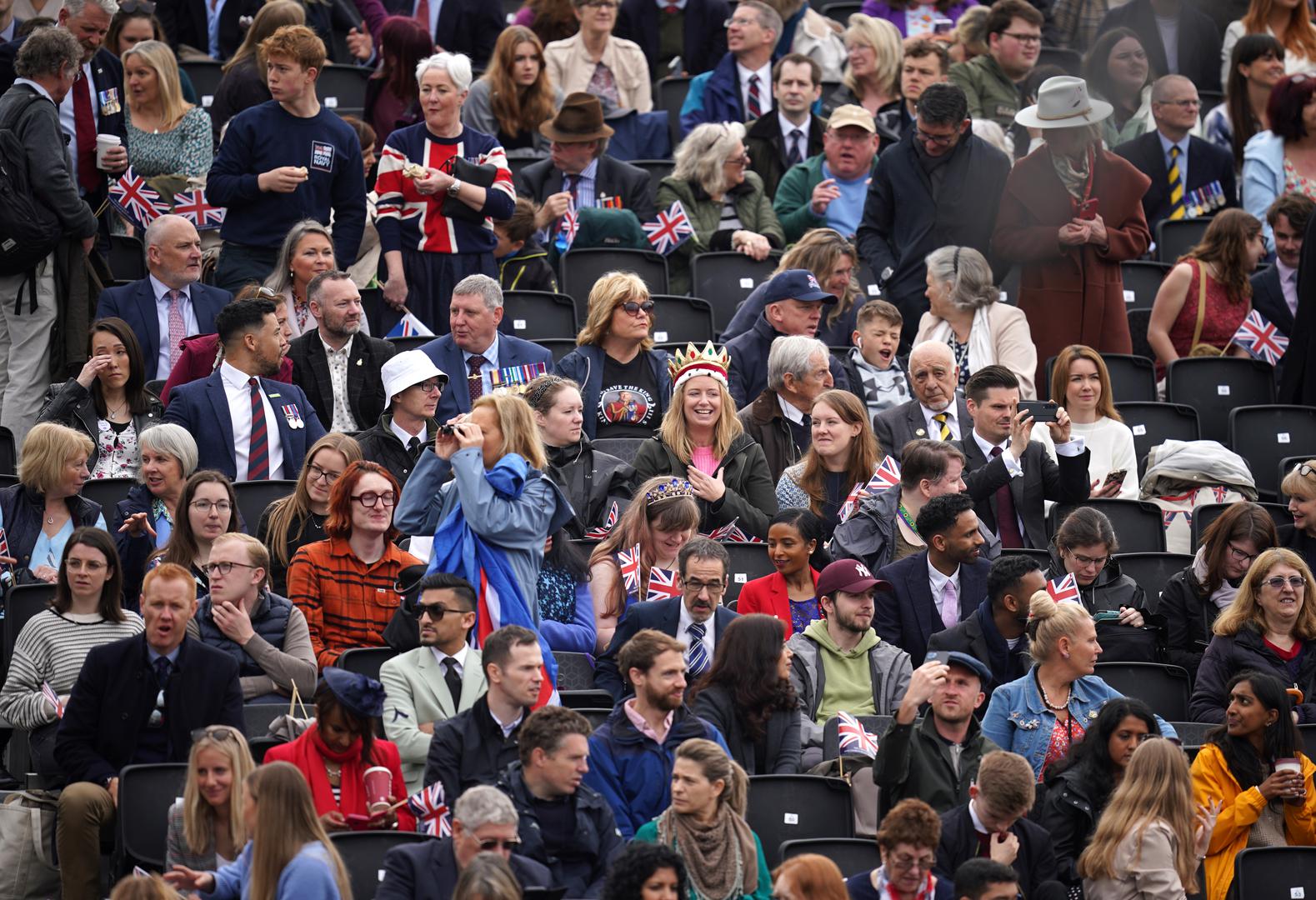 Crowds in the grandstand opposite Buckingham Palace ahead of the coronation ceremony of King Charles III and Queen Camilla. Picture date: Saturday May 6, 2023. Photo: Niall Carson/PRESS ASSOCIATION