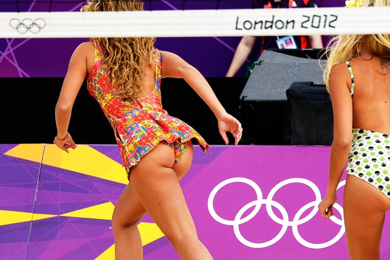 'Cheerleaders perform at Centre Court of the stadium in Horse Guards Parade during the women Beach Volleyball preliminary phase - Pool B match of the London 2012 Olympic Games, on July 28, 2012 .AFP P