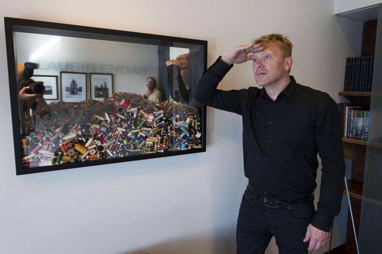 'TO GO WITH AFP STORY BY Pierre-Henry DESHAYES - This picture taken on August 4, 2010 shows Jon Gnarr Mayor of Reykjavik posing in his office at Reykjavik City Hall. He promised a polar bear in the lo