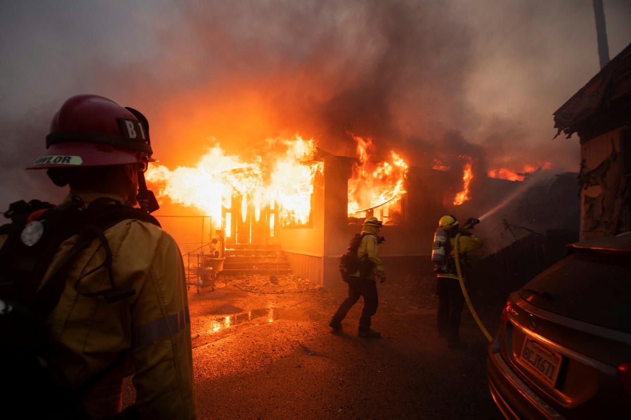 Palisades Fire burns during a windstorm on the west side of Los Angeles