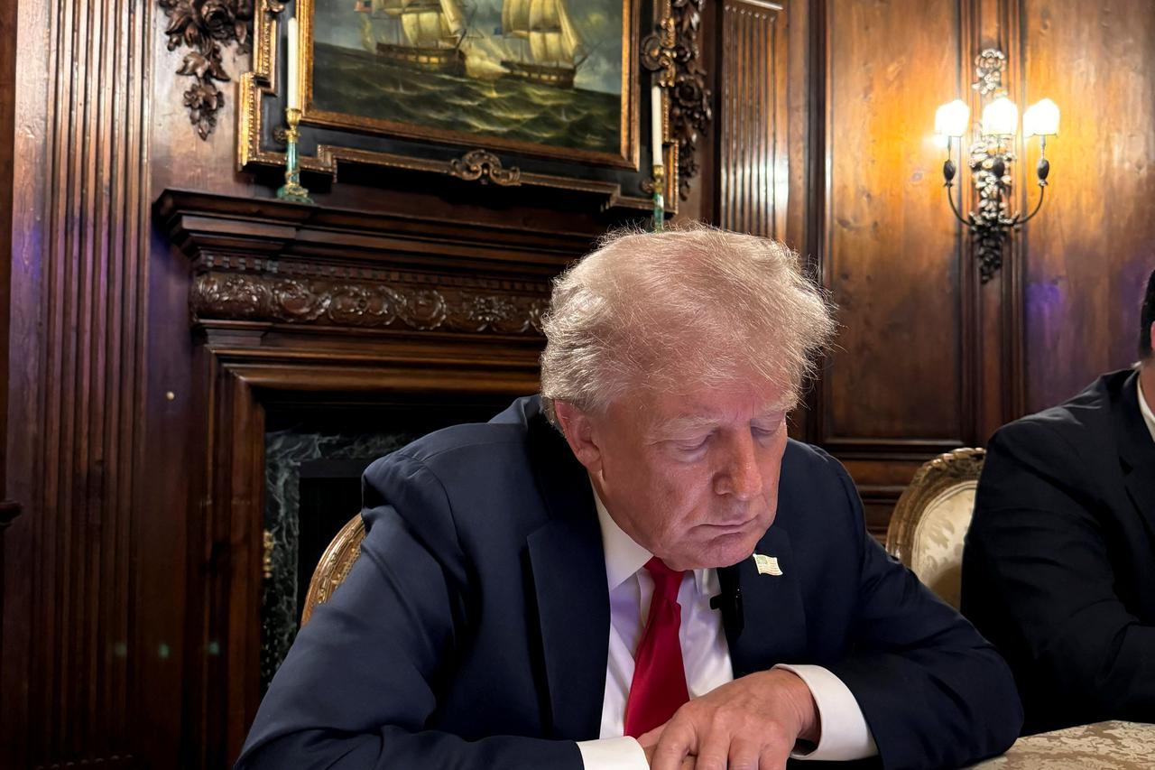 Former U.S. President Donald Trump speaks as he participates in an interview with billionaire entrepreneur Elon Musk on the social media platform X, at Mar-a-Lago in Palm Beach