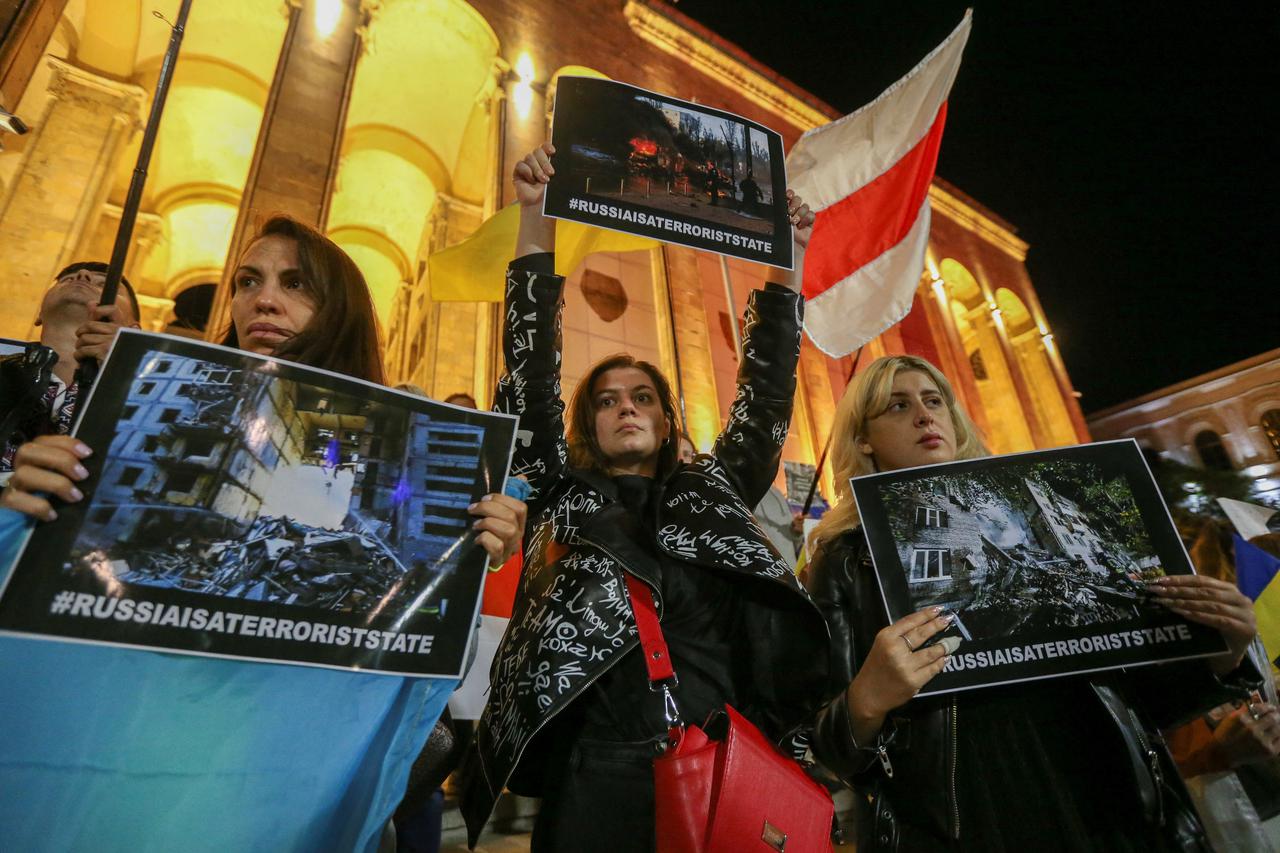 People hold a rally in support of Ukraine in Tbilisi