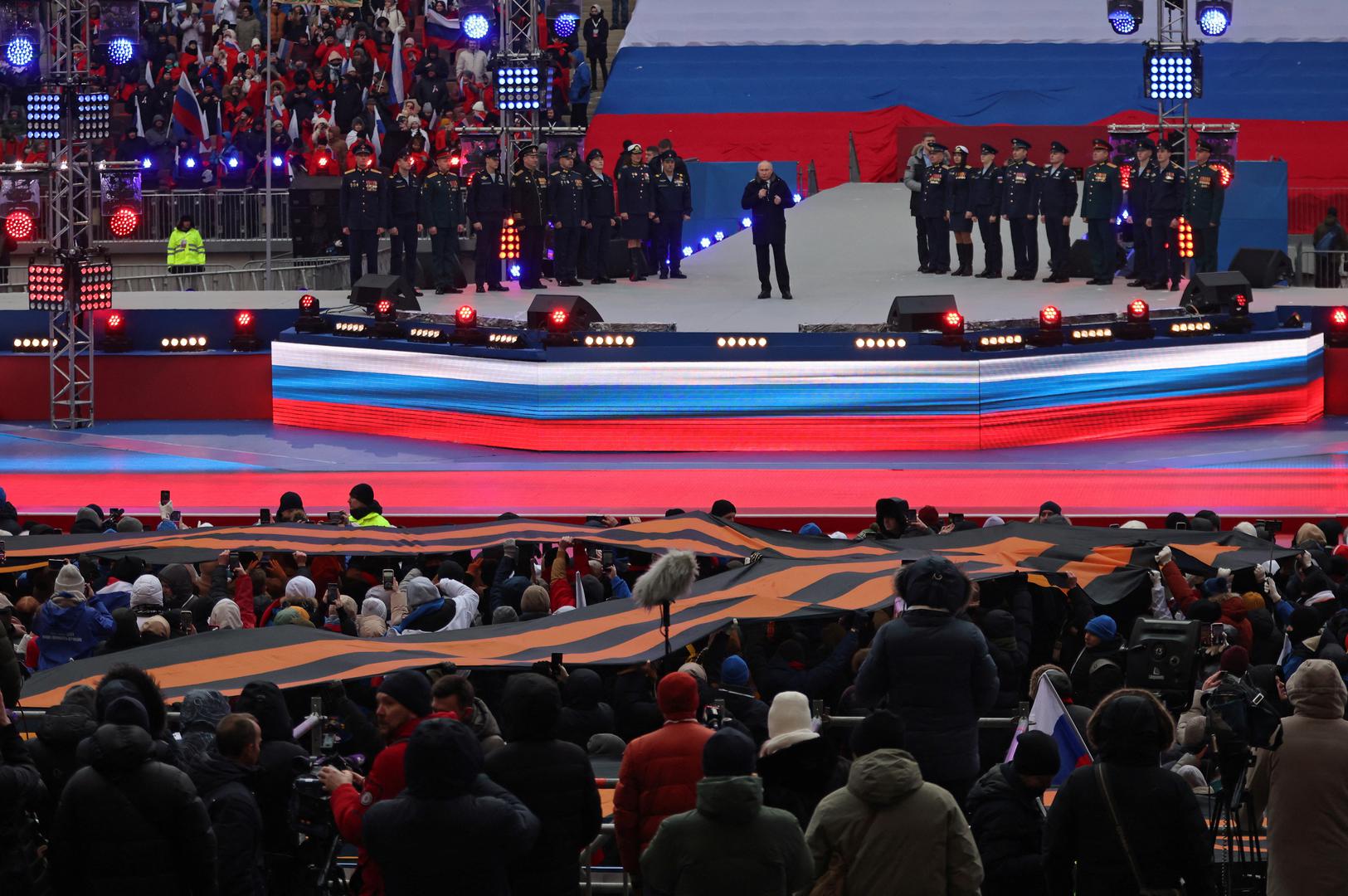 Russian President Vladimir Putin delivers a speech during a concert "Glory to the Defenders of the Fatherland" in support of the Russian armed forces involved in the country's military campaign in Ukraine, at Luzhniki Stadium in Moscow, Russia February 22, 2023. REUTERS/Stringer Photo: Stringer/REUTERS