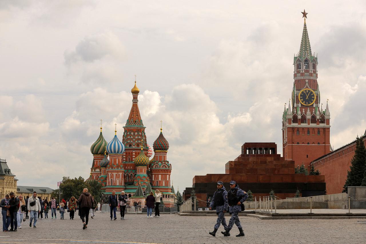 FILE PHOTO: People walk in central Moscow