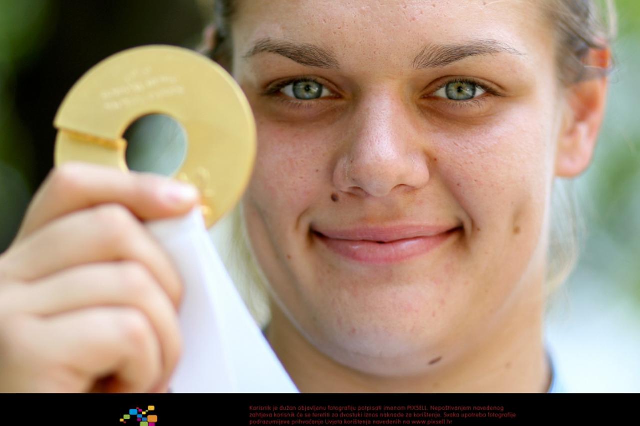 '03.07.2012., Zagreb - Sandra Perkovic s osvojenom zlatnom medaljom na Europskom prvenstvu u Helsinkiju.  Photo: Igor Kralj/PIXSELL'