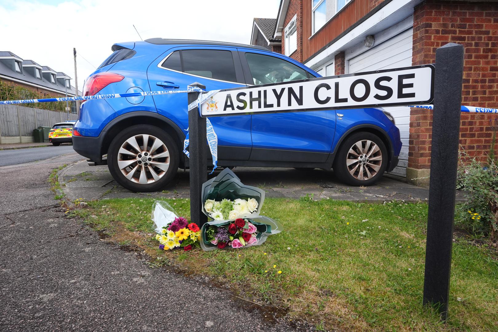 Floral tributes left near to the scene in Ashlyn Close, Bushey, Hertfordshire, where the wife and two daughters of a BBC sports commentator have been killed in a crossbow attack at their home. Carol Hunt, 61, who was married to BBC Five Live racing commentator John Hunt, and two of their daughters died in Ashlyn Close, Bushey, Hertfordshire, on Tuesday evening. A manhunt has been launched for Kyle Clifford, 26, from Enfield, north London, who is wanted by detectives investigating the murders of the three women. Picture date: Wednesday July 10, 2024. Photo: James Manning/PRESS ASSOCIATION