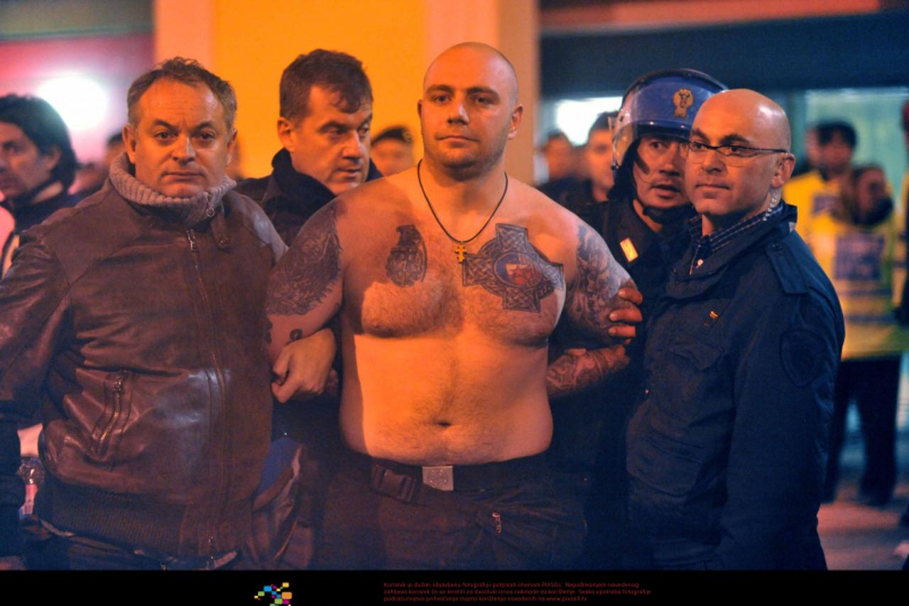 'Genova - scontri tra tifosi serbi e polizia - guerriglia urbana nelle strade - Ivan il leader degli ultra serbi    Genoa -  Nationalist Crowd Trouble Halts Italy v Serbia Game  Genoa, Italy - The Eur