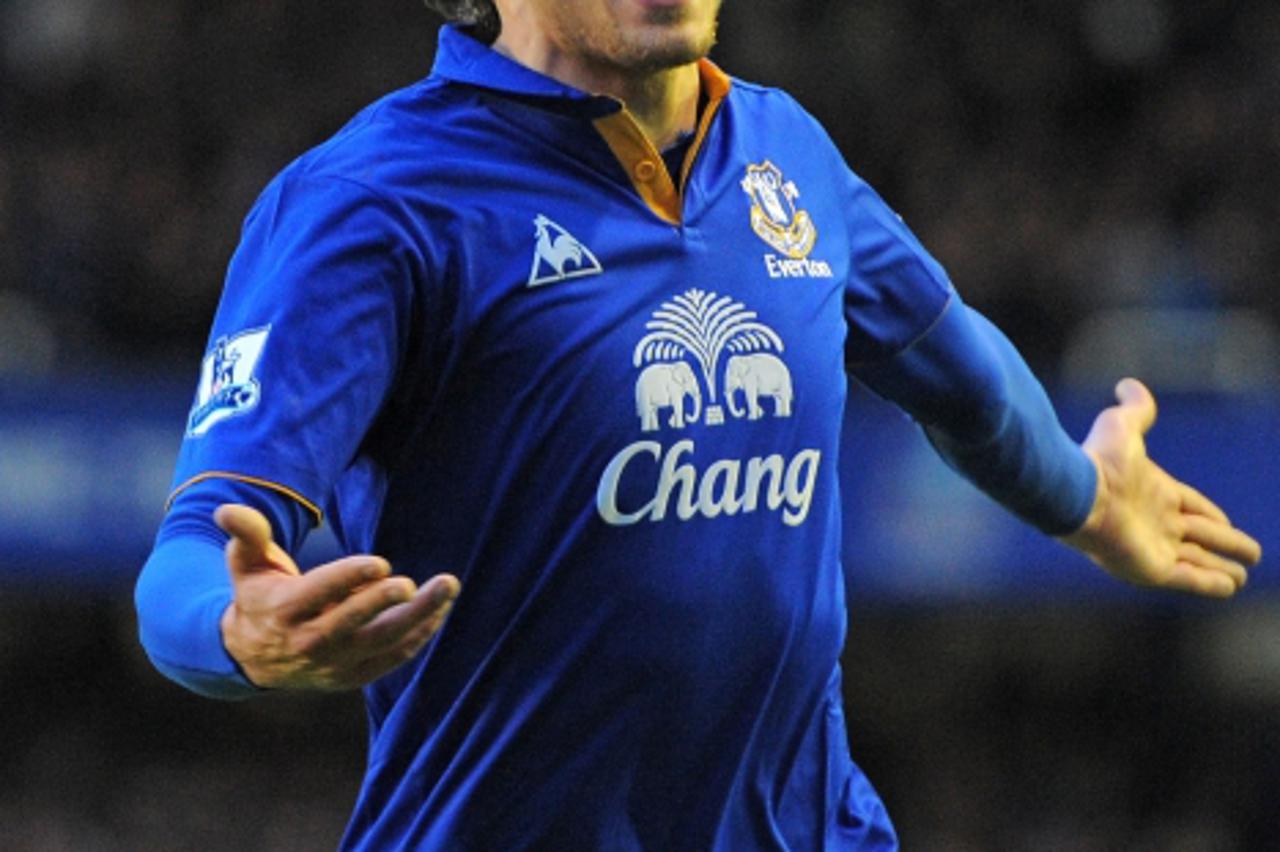 'Everton\'s Croatian striker Nikica Jelavic celebrates scoring the opening goal of the English Premier League football match between Everton and Tottenham Hotspur at Goodison Park in Liverpool, north-