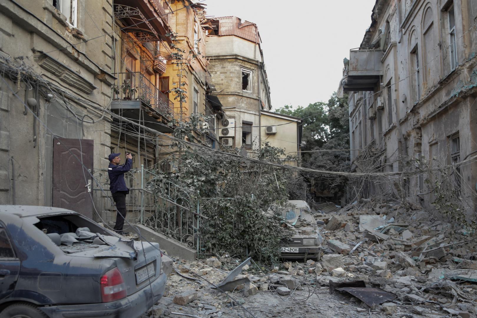 A rescuer takes a picture of a residential building damaged during a Russian missile strike, amid Russia's attack on Ukraine, in Odesa, Ukraine July 23, 2023.  REUTERS/Serhii Smolientsev Photo: Stringer/REUTERS