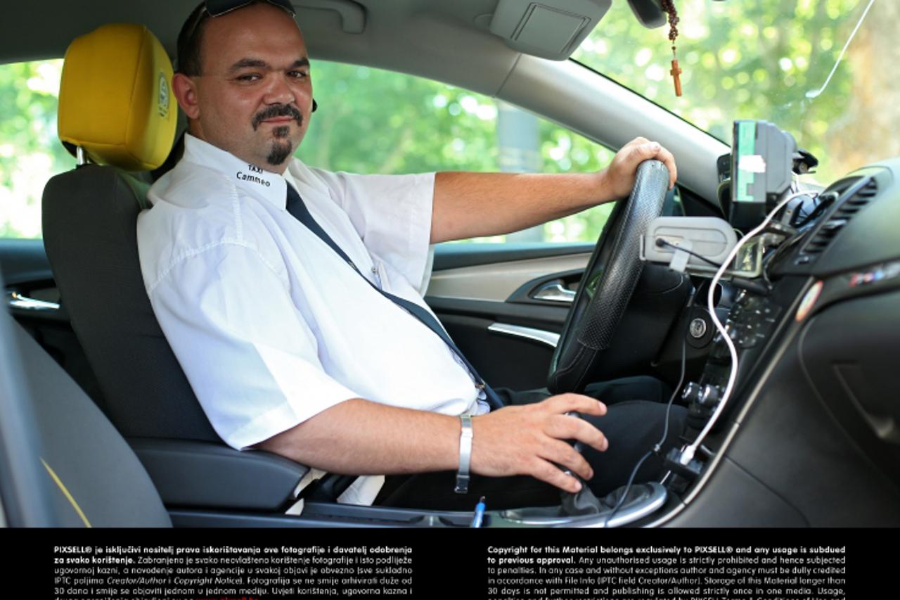 '02.06.2013., Zagreb - Silvio Horvat je vozac Taxi Cammea, a ujedno i kuhar koji priprema jela za razne zabave.  Photo: Sanjin Strukic/PIXSELL'