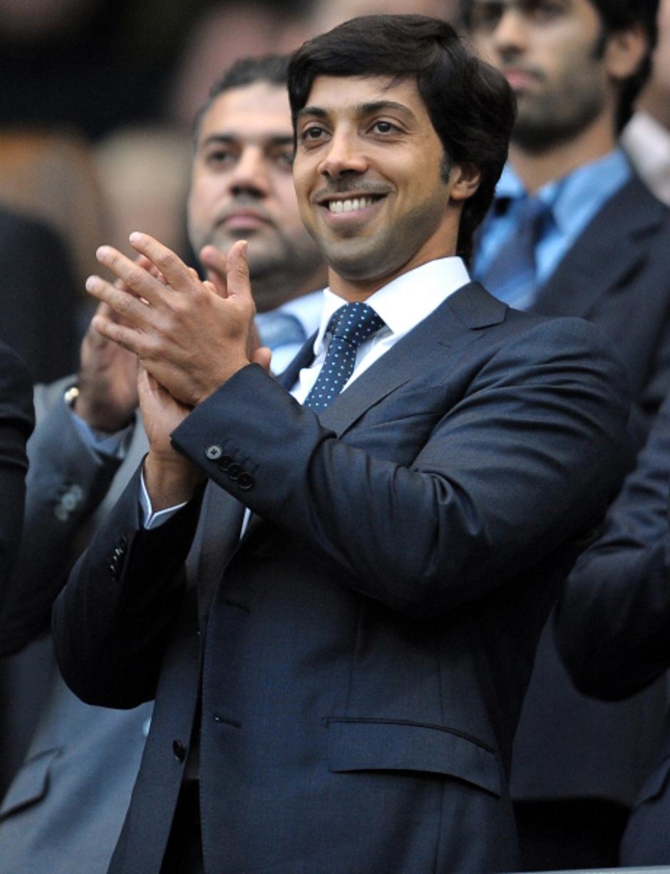 'Manchester city owner Sheikh Mansour bin Zayed Al Nahyan looks on during the English Premier League football match against Liverpool at The City of Manchester stadium, Manchester, north-west England 