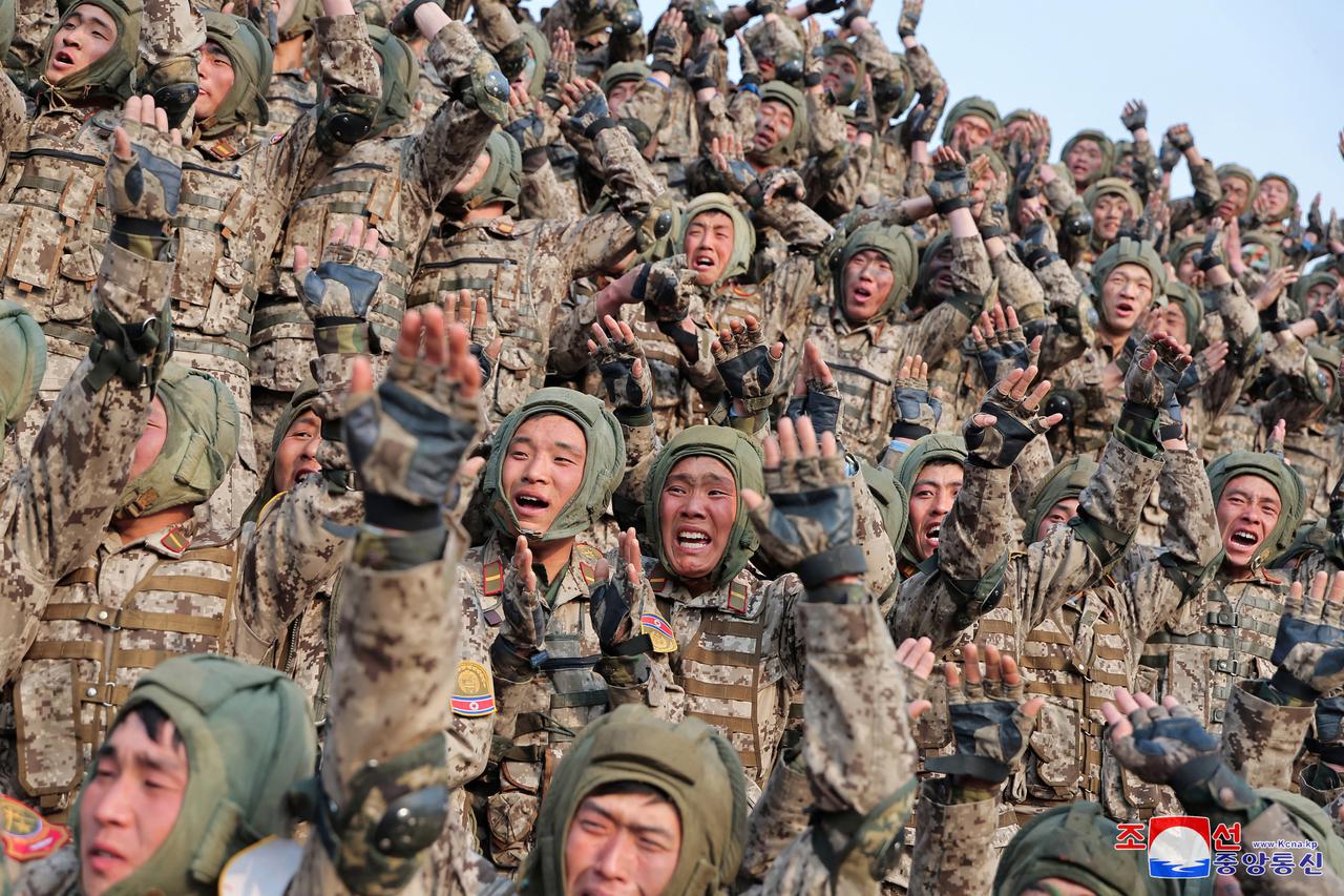 North Korean leader Kim Jong Un guides the training of the Korean People's Army's air and amphibious combat units