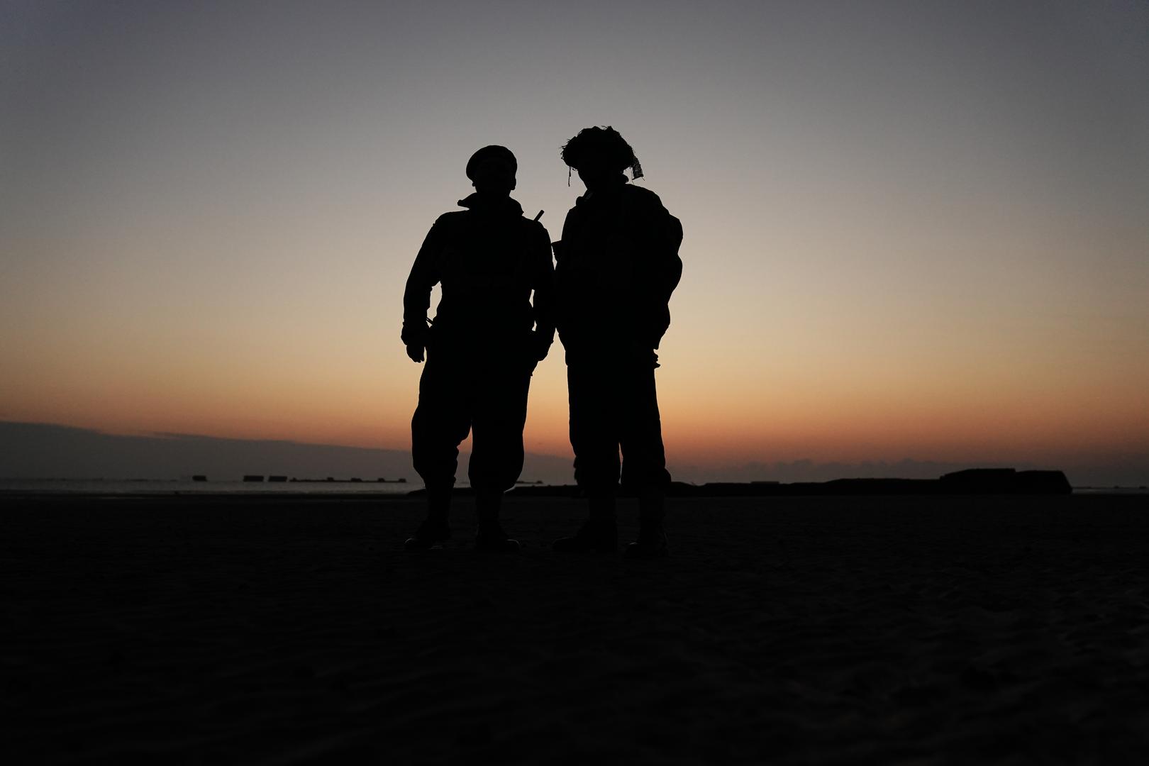 Re-enactors on Gold Beach in Arromanches at sunrise in Normandy, France, to commemorate the 80th anniversary of the D-Day landings. Picture date: Thursday June 6, 2024. Photo: Aaron Chown/PRESS ASSOCIATION