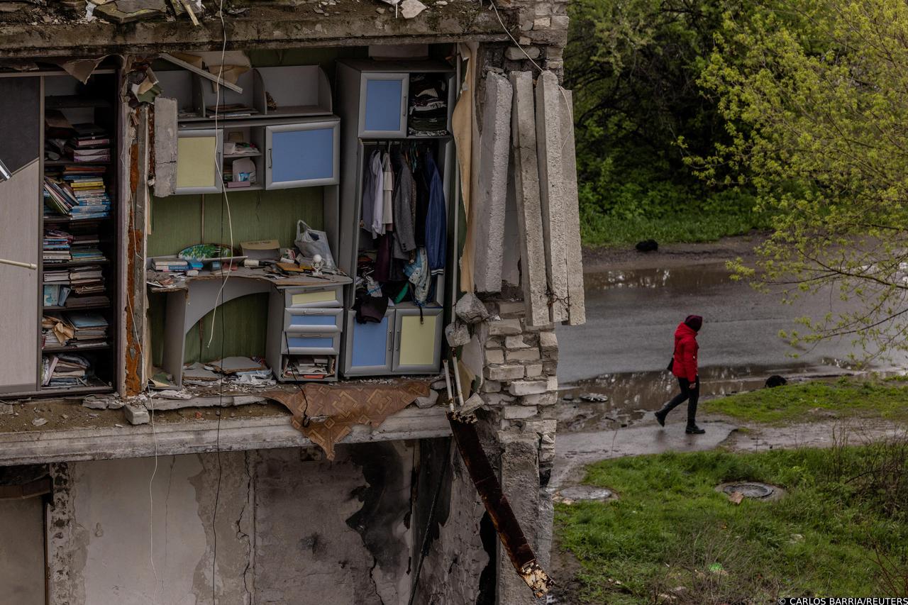 An apartment building destroyed by Russian shelling is seen in the outskirts of Izium, in Kharkiv region, Ukraine