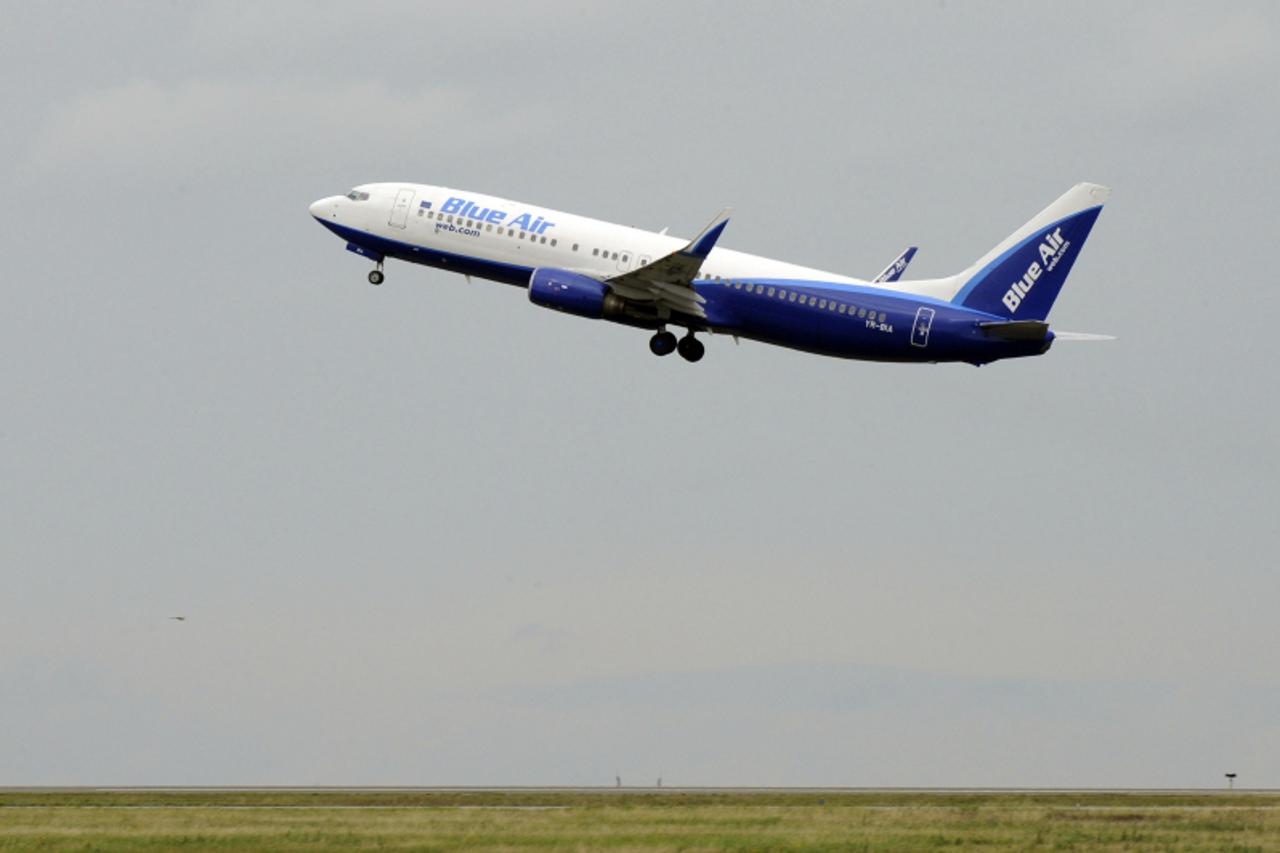 'The airplane carrying families of Roma community takes off at the Roissy Charles de Gaulle airport, outside Paris, on August 26, 2010, on its way to the Romanian capital, Bucharest, as French governm