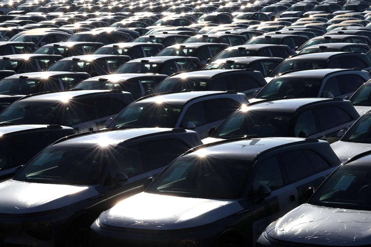 FILE PHOTO: New cars, among them China-built electric vehicles of the company Xpeng, are seen parked in the port of Zeebrugge