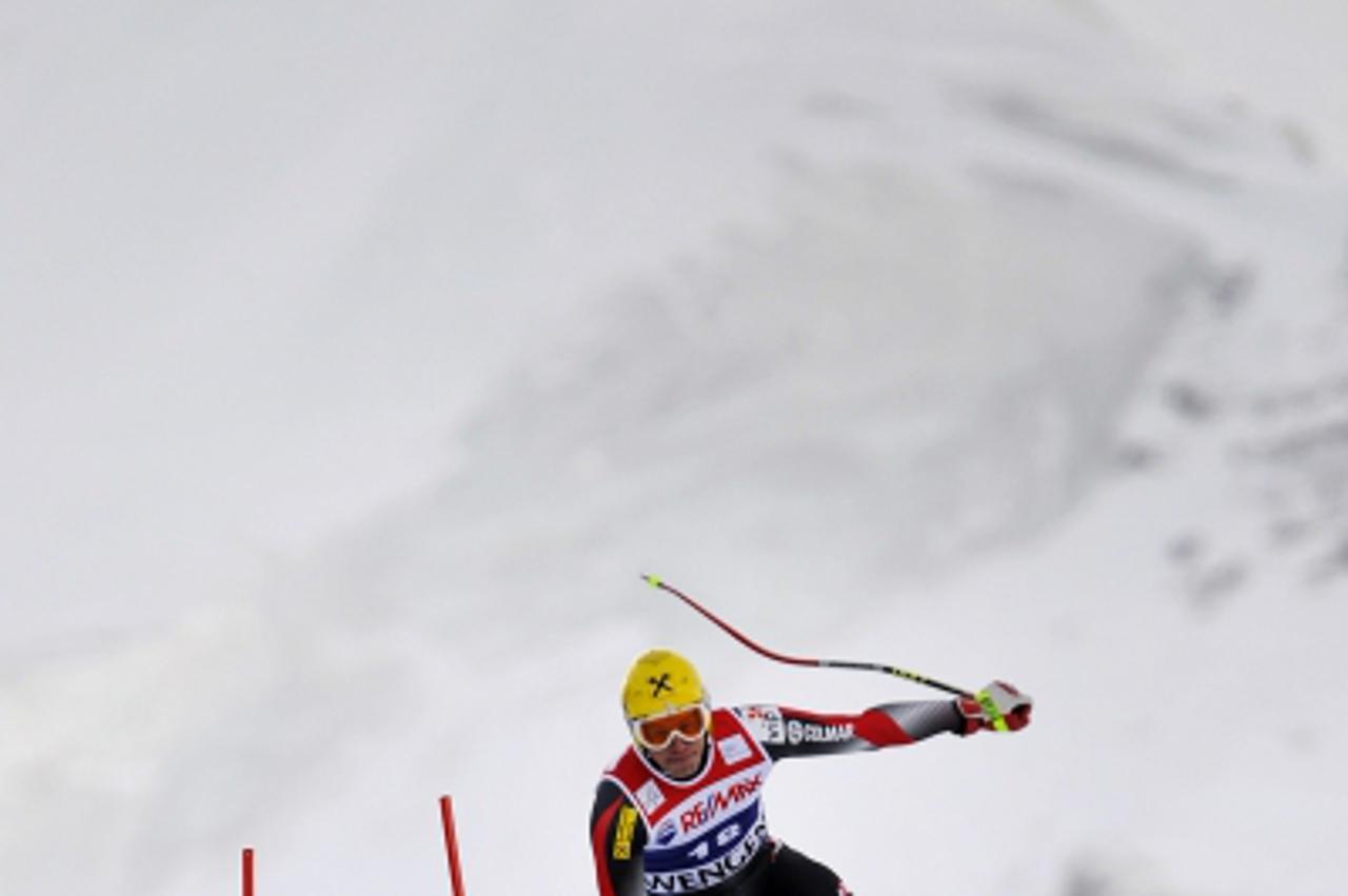 'Croatia\'s Ivica Kostelic jumps during the downhill event in the Men\'s Super Combined race at the FIS Alpine Skiing World Cup on January 14, 2011 in Wengen. AFP PHOTO / FABRICE COFFRINI'