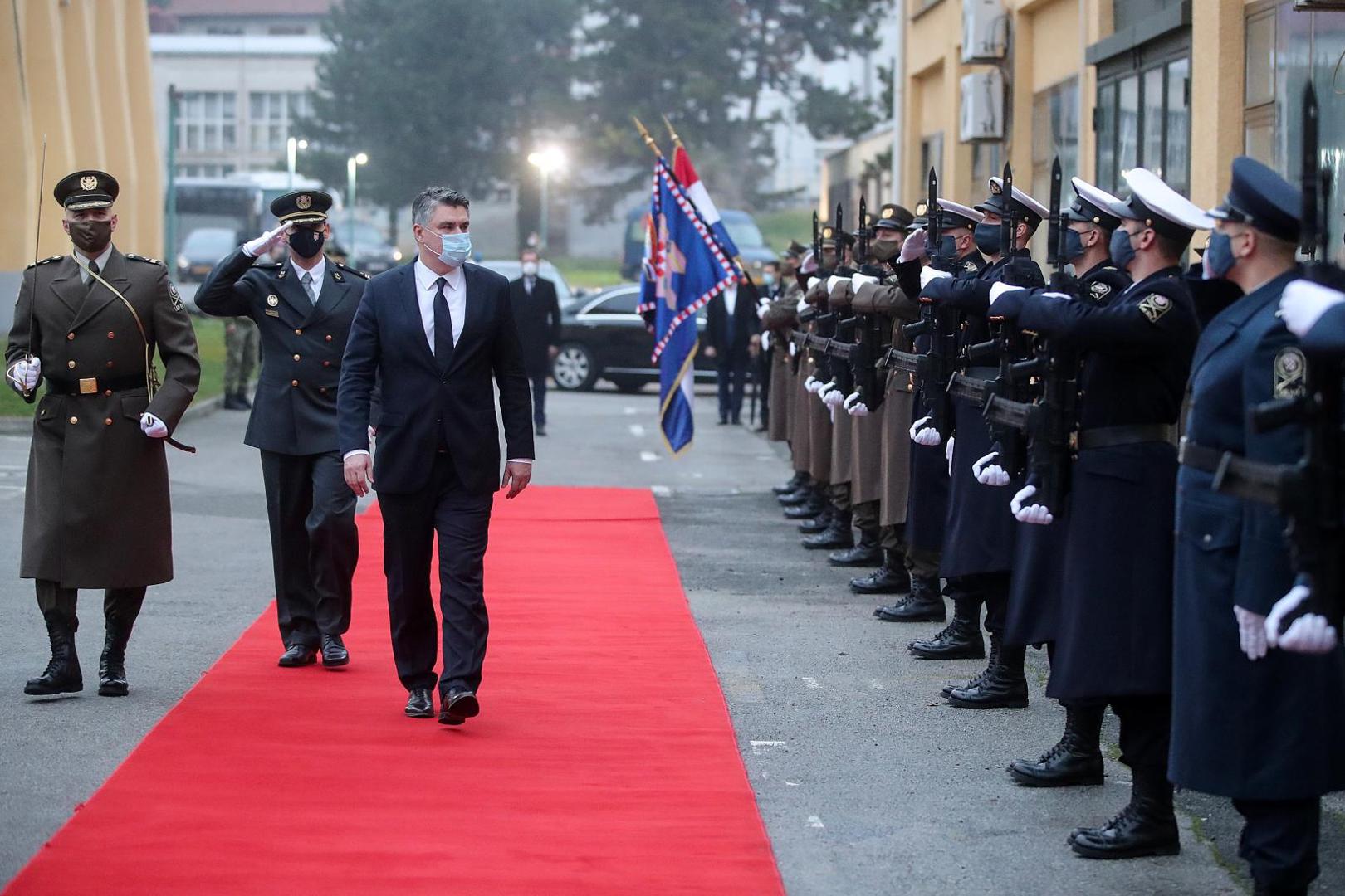 21.12.2020., Zagreb - Predsjednik Republike i vrhovni zapovjednik Oruzanih snaga Republike Hrvatske Zoran Milanovic, uz ministra obrane Maria Banozica i nacelnika Glavnog stozera Oruzanih snaga RH admirala Roberta Hranja sudjelovao je na obiljezavanju 29. obljetnice osnutka Hrvatskog vojnog ucilista Dr. Franjo Tudjman i svecanoj promociji polaznika preddiplomskih i diplomskih sveucilisnih studija Vojno inzenjerstvo i Vojno vodjenje i upravljanje, koja se odrzala u vojarni Petar Zrinski na Hrvatskom vojnom ucilistu Doktor Franjo Tudjman. 
Photo: Goran Stanzl/PIXSELL