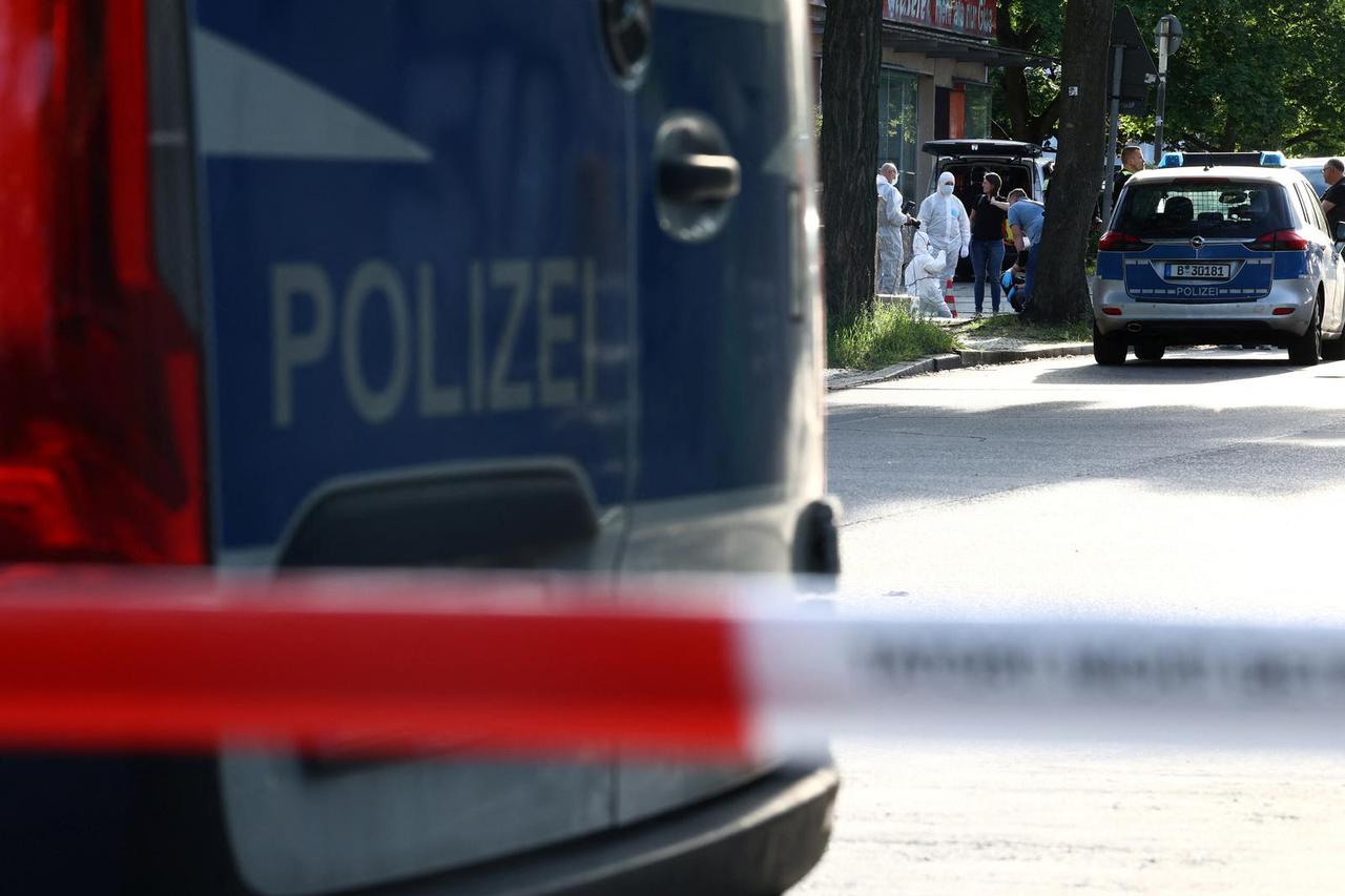 Police at the scene after a man was shot in Berlin