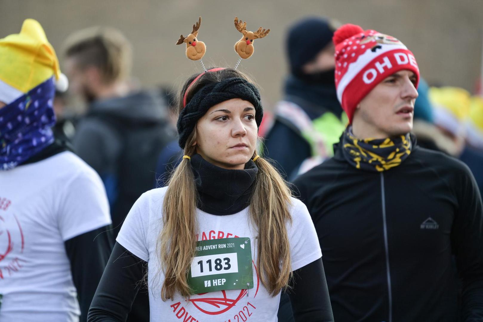 12.12.2021., Zagreb - Humanitarna i kostimirana utrka Zagreb Advent Run odrzala se u centru grada, njih vise od 2000 iz cak 29 drzava trcali su  za plemeniti cilj i pruzili podrsku zenama u borbi protiv razlicitih oblika raka. Ovogodisnji partner utrke je Udruga zena oboljelih i lijecenih od raka „Nismo same“.