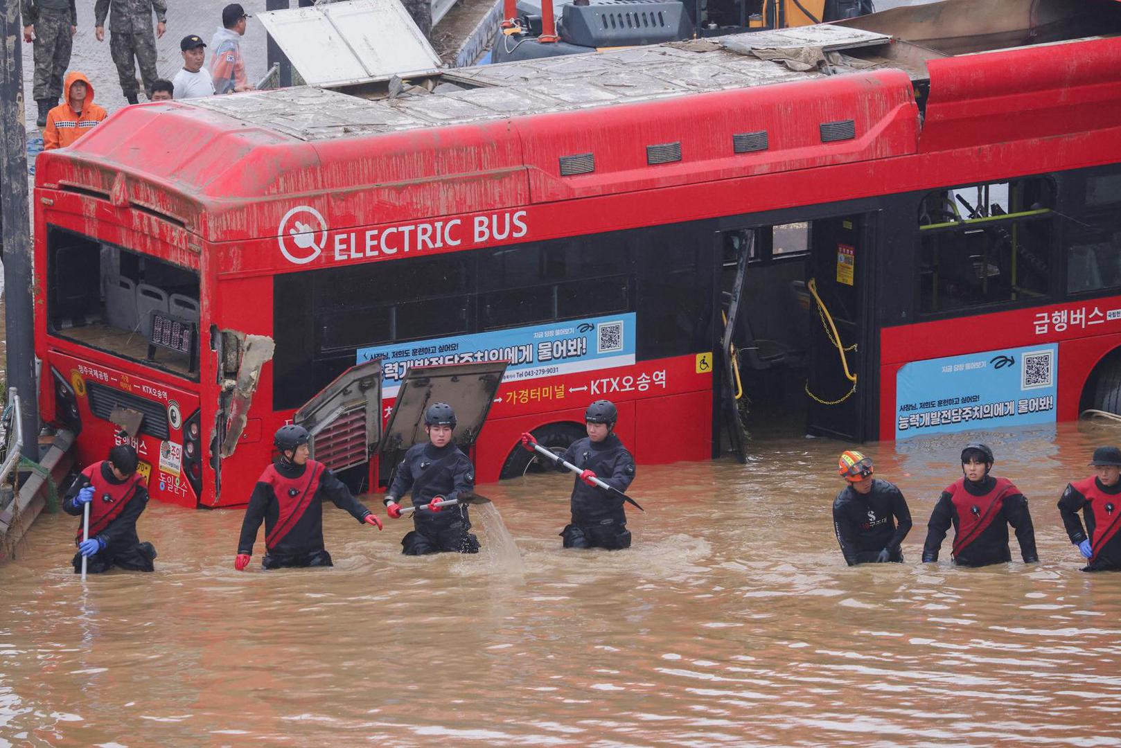 Rescue workers take part in a search and rescue operation near an underpass that has been submerged by a flooded river caused by torrential rain in Cheongju, South Korea, July 16, 2023.   REUTERS/Kim Hong-ji Photo: KIM HONG-JI/REUTERS