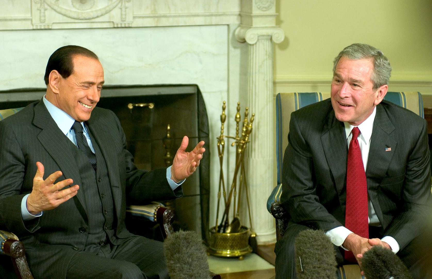 Washington, D.C. - February 28, 2006 -- United States President George W. Bush meets Prime Minister Silvio Berlusconi of Italy in the Oval Office of the White House on February 28, 2006..Credit: Ron Sachs / CNP Photo via Newscom Photo: Ron Sachs/NEWSCOM