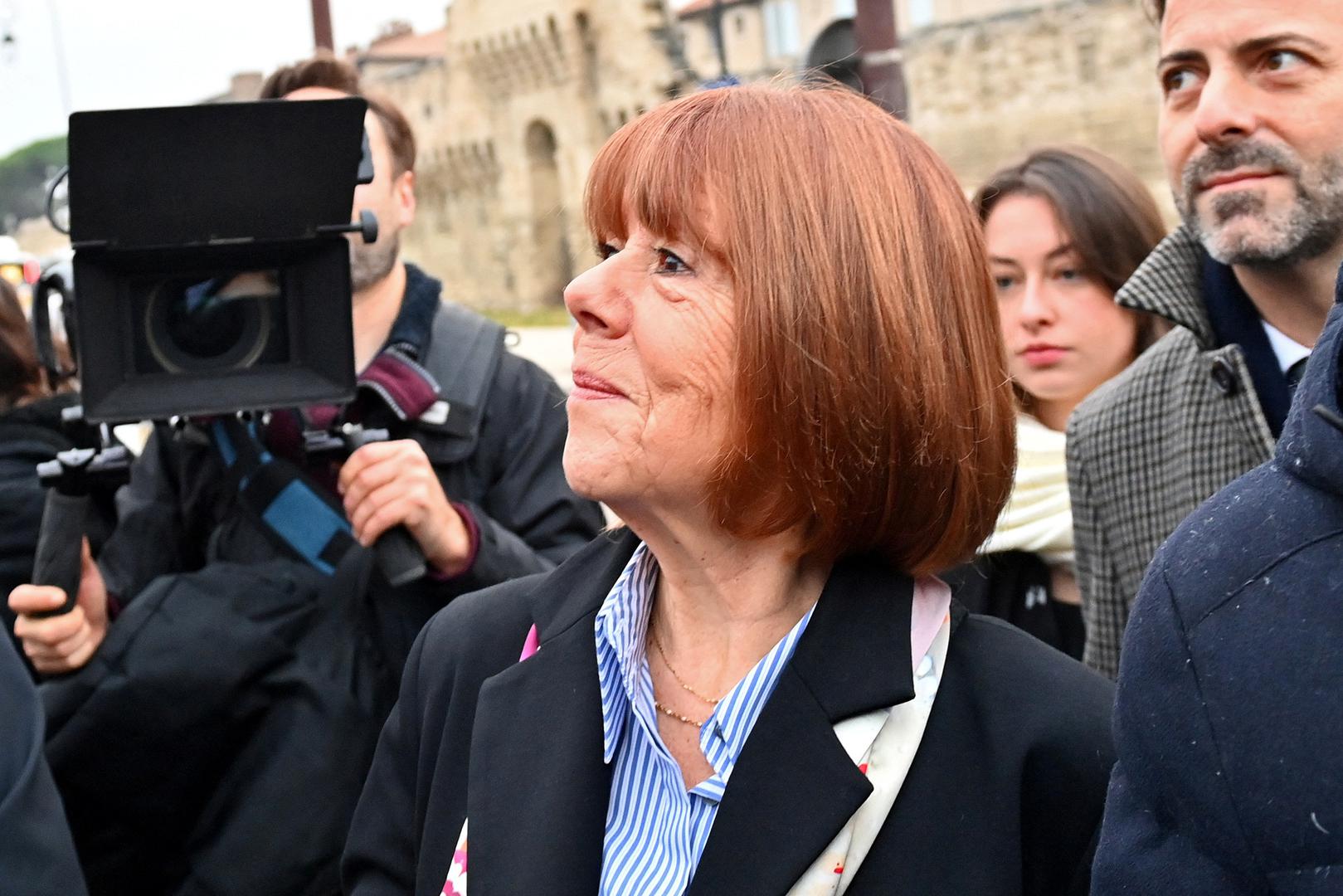 Frenchwoman Gisele Pelicot, the victim of an alleged mass rape orchestrated by her then-husband Dominique Pelicot at their home in the southern French town of Mazan, arrives with her lawyers to attend the verdict in the trial for Dominique Pelicot and 50 co-accused, at the courthouse in Avignon, France, December 19, 2024. REUTERS/Alexandre Dimou Photo: ALEXANDRE DIMOU/REUTERS