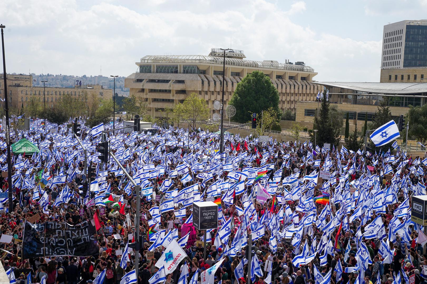 Israelis protest during a demonstration after Israeli Prime Minister Benjamin Netanyahu dismissed the defense minister and his nationalist coalition government presses on with its judicial overhaul, in Jerusalem, March 27, 2023. REUTERS/Itai Ron  NO RESALES. NO ARCHIVES Photo: Stringer/REUTERS