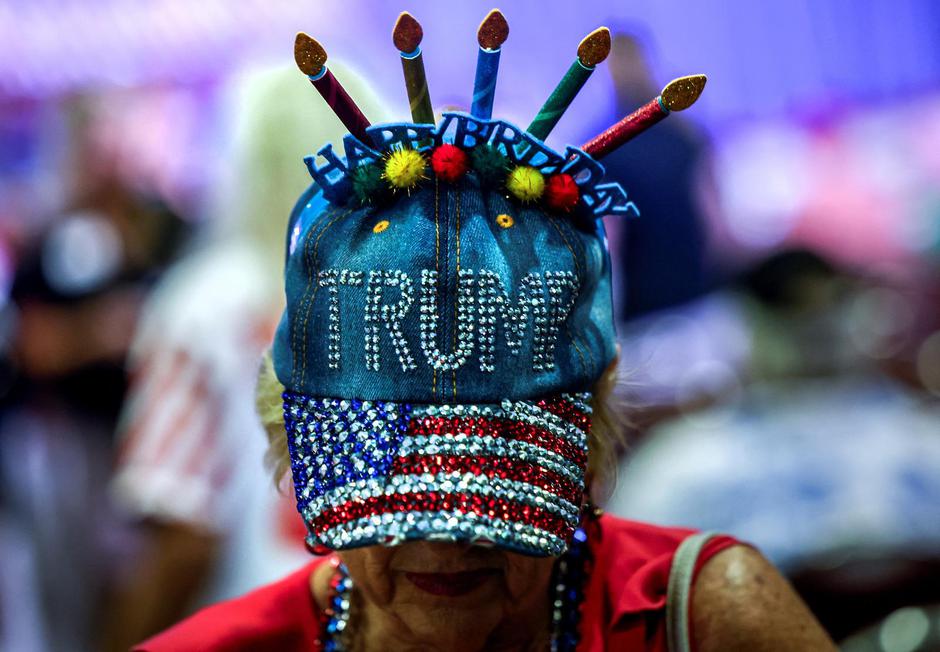 Supporters of former U.S. President and Republican presidential candidate Donald Trump attend a rally and celebration of his birthday in Florida