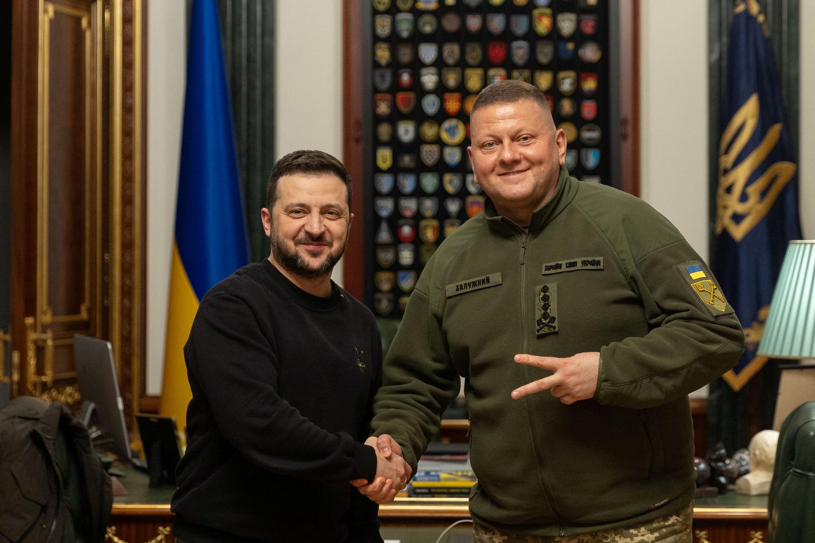 Ukraine's President Volodymyr Zelenskiy and Commander in Chief of the Ukrainian Armed Forces Valerii Zaluzhnyi shake hand and pose for a picture during their meeting, amid Russia's attack on Ukraine, in Kyiv, Ukraine February 8, 2024. Ukrainian Presidential Press Service/Handout via REUTERS ATTENTION EDITORS - THIS IMAGE HAS BEEN SUPPLIED BY A THIRD PARTY. Photo: Ukrainian Presidential Press Ser/REUTERS