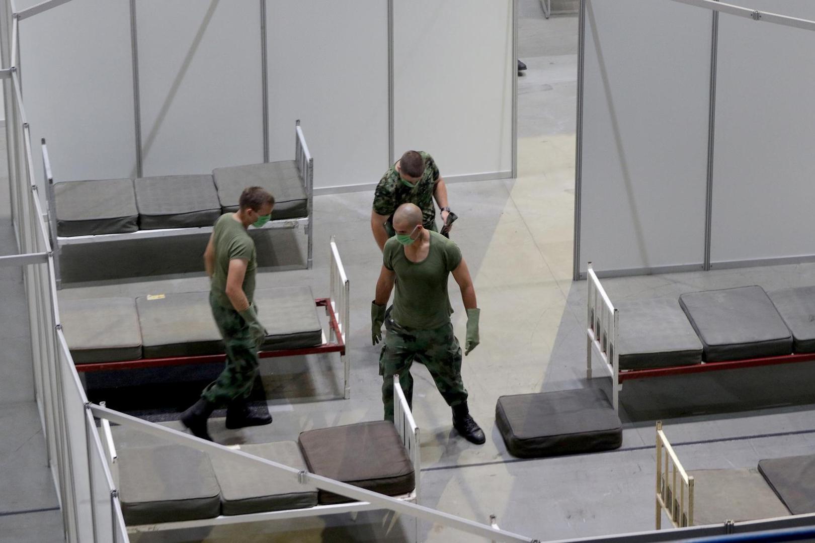 06, July, 2020, Belgrade - The Ministry of Health and the Army of the Republic of Serbia are setting up military beds in the Stark Arena to form a temporary covid hospital for people who have mild symptoms of the coronavirus. Photo: Antonio Ahel/ATAImages/PIXSELL

06, jul,2020, Beograd - Ministarstvo zdravlja i Vojska Republike Srbije namestaju vojne krevete u Stark areni za formiranje privremene kovid bolnice za ljude koji imaju blaze simtome korona virusa. Photo: Antonio Ahel/ATAImages/PIXSELL