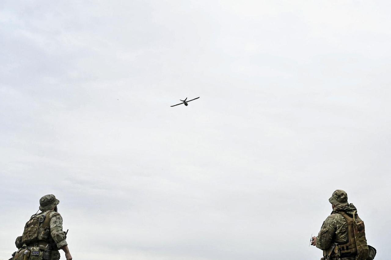 Ukrainian servicemen launch a reconnaissance drone for flying over positions of Russian troops in Zaporizhzhia