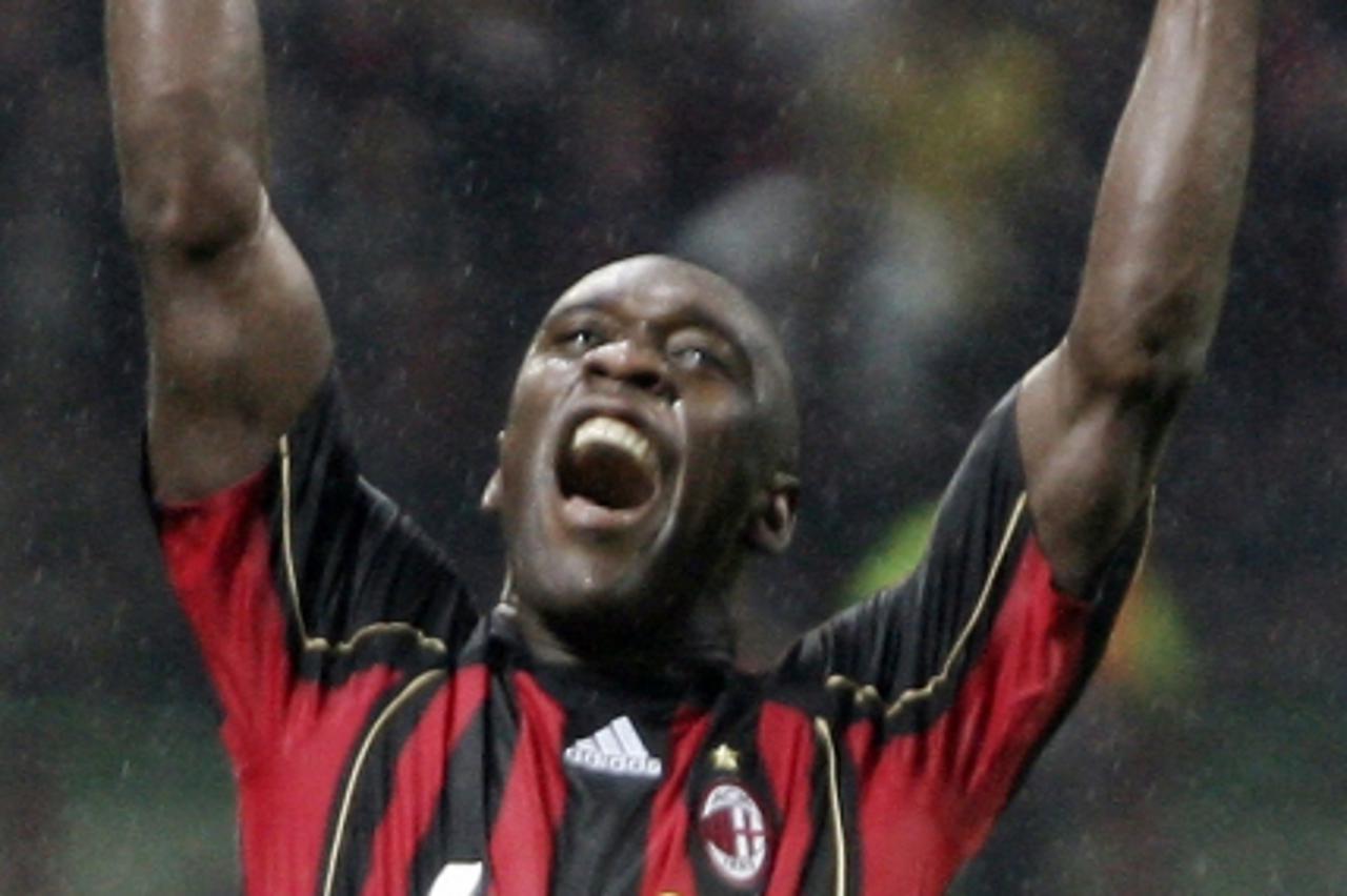 'AC Milan\'s Clarence Seedorf celebrates after scoring against Manchester United during their Champions League semi-final second leg soccer match at the San Siro stadium in Milan May 2, 2007.      REU